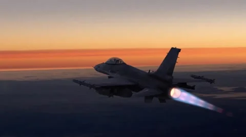F16 flying at sunrise Stock Footage