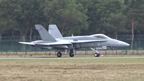 F18 Fighter Jet Taxiing at air base prior take off Stock Footage