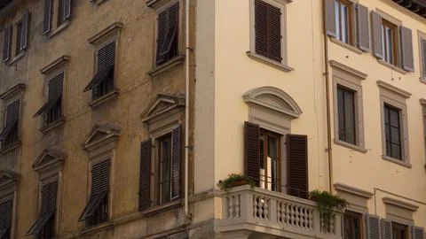 The faade of a typical old building in the city of Florence in Tuscany (Italy Stock Photos