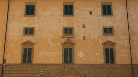 The faade of a typical old building in the city of Florence in Tuscany (Italy Stock Photos
