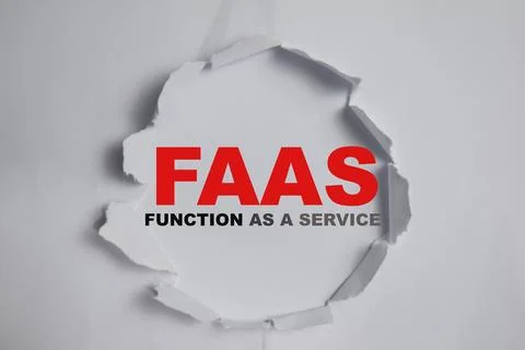 FAAS - function as a service undernead Text written in torn paper Stock Photos