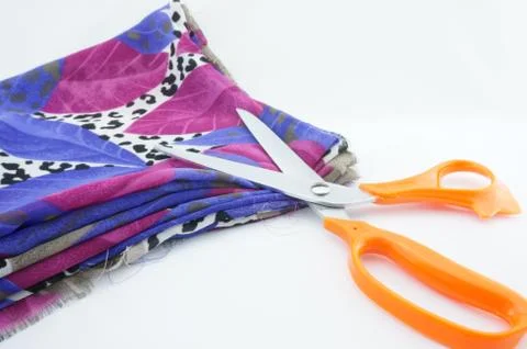Fabric and scissors Stock Photos