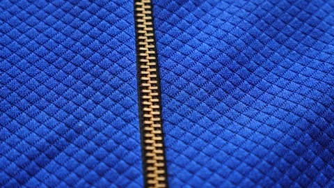 Fabric as background. 4k, slow motion, blue textured fabric, zip fastener Stock-Footage 81464009