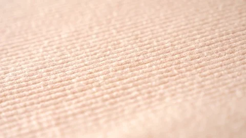 Fabric as background. 4k, slow motion, beige knitted fabric Stock-Footage 81726273
