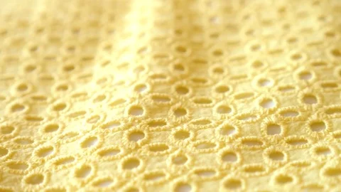Fabric as background. 4k, slow motion, yellow knitted fabric. Stock-Footage 81727455