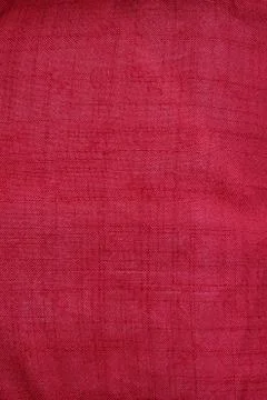 Fabric background. Clothes close-up. Texture. Burgundy background 스톡 사진