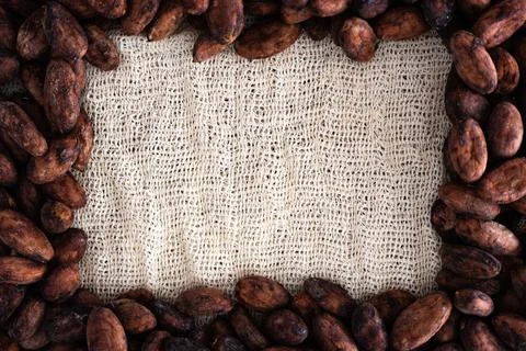 Fabric background mockup with empty space and cocoa bean frame Stock Photos