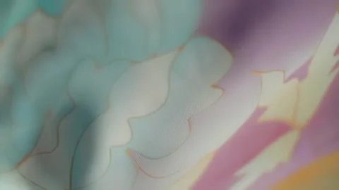 Fabric with beautiful colorful flora patterns flutters in the wind Stock Footage 303170280