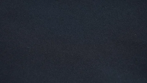 Fabric black texture close-up footage. Warm stitched synthetic materials Stock Footage 314333550