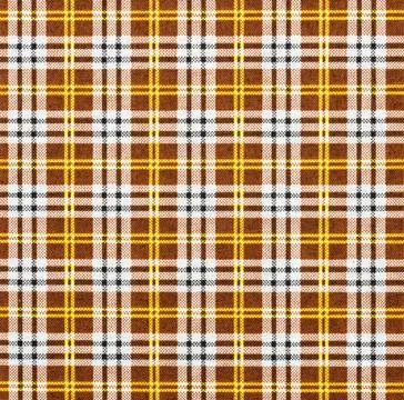 Fabric with a checked pattern in brown tones Fabric with a checked pattern... Stock Photos