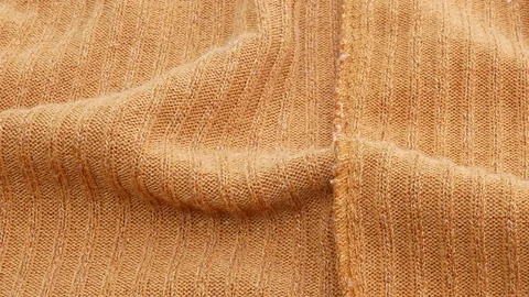 Fabric close-up background for line grooves sweater; moving from left to right. Stock Footage 104603697