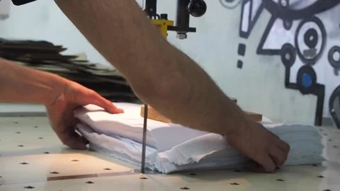 Fabric cutting in a factory using the machine Stock Footage 130829296