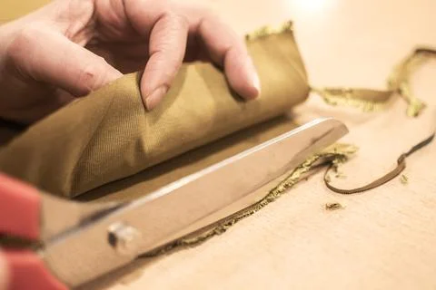 Fabric Cutting Process With Scissors In Tailoring Workshop Stock Photos