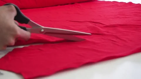 Fabric cutting with scissors red Video stock 130827353