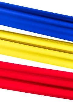 Fabric flag of Romania. Develops in the wind. Isolated on white background. Stock Photos