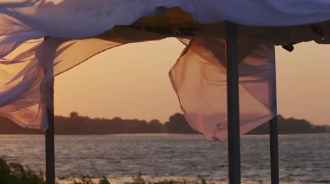 Fabric fluttering in the sunset Stock Footage 66464058