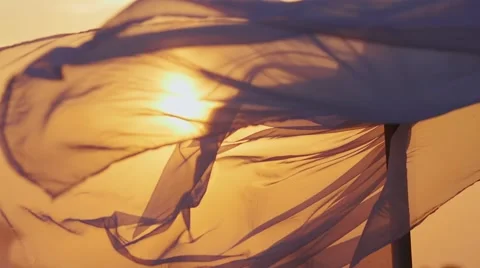 Fabric fluttering at sunset Stock Footage 68038147