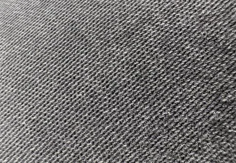 Fabric forms woven textile background. Natural linen cotton material with gre Stock Photos