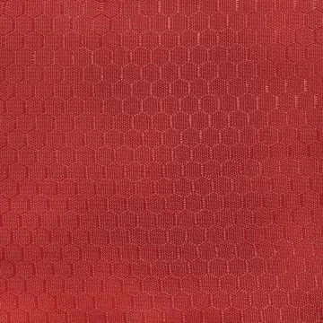 Fabric with geometric pattern in the form of honeycomb.Texture or background Foto stock