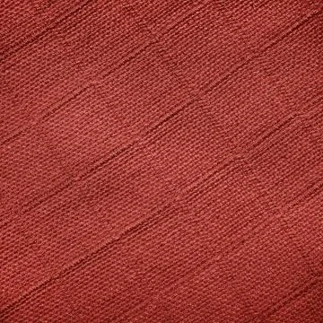 Fabric with geometric pattern in the form of a square of dark red color Stock Photos