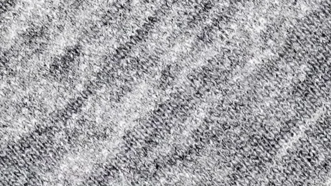 Fabric gray dark close-up rotating, turning 動画素材 243988401