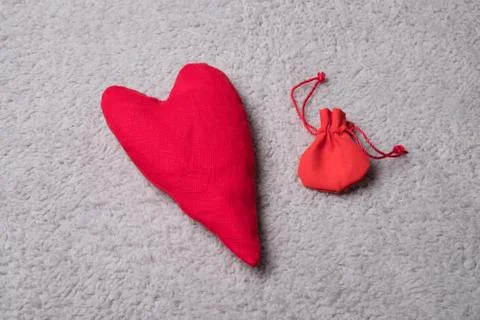 Fabric heart studio image. Red heart on a gray background. Stock Photos