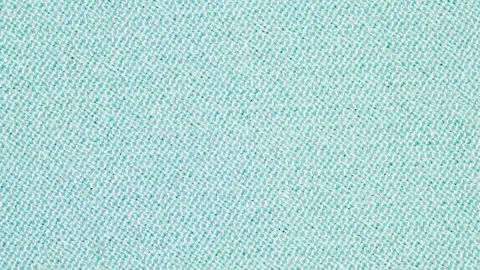Fabric light blue close-up, rotating, turning Stock Footage 242360894