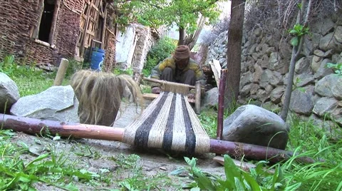Fabric making on old loom Stock Footage 55074371