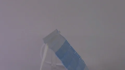 Fabric mask , slide down Stock Footage 129607281