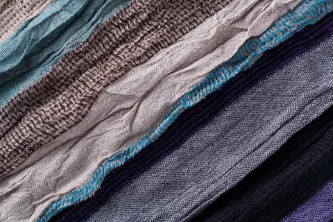 Fabric with multicolor striped pattern background closeup texture Stock Photos