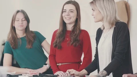 Fabric, pattern and sewing tools lie on the sewing table Stock Footage 74244945