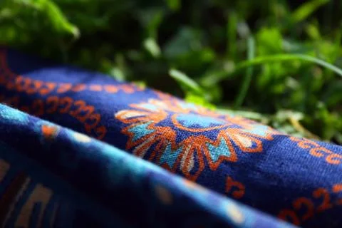 Fabric with a pattern on the grass Stock Photos