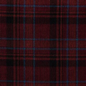 Fabric with a pattern of red and blue squares. Background texture 写真素材