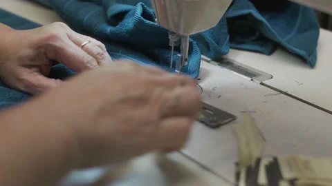 Fabric production worker at her workplace, making clothes and fabrics Stock Footage 150701982