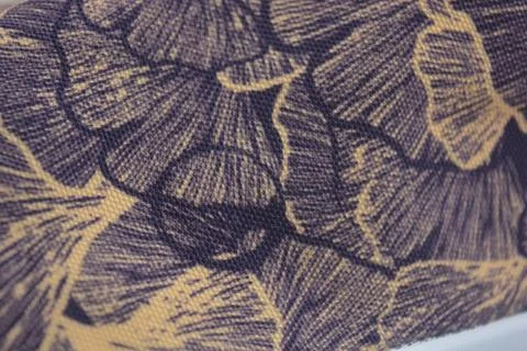 Fabric purple, orange background with a pattern of leaves. Foto stock