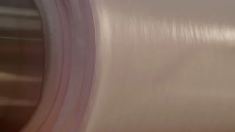 Fabric roll spin in slowmotion Stock Footage 143775284