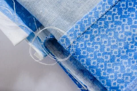 Fabric samples and losse thread ready for crafting Stock Photos