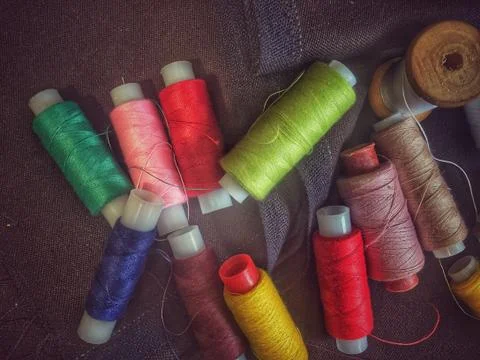 Fabric samples and thread Fotos de archivo