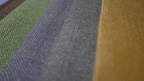 Fabric Samples Of Different Colors In Move Are Spinning And Rotation Stock Footage 81370398