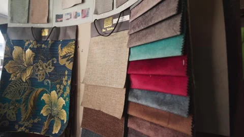 Fabric samples displayed in songkok maker shop in Malaysia. Variety of textures Stock Footage 333134087
