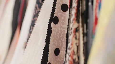 Fabric samples textile in market shop, colorful palette cloth accessories Stock Footage 285660229