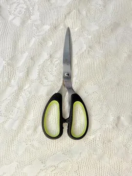 Fabric scissors on the white background Stock Photos