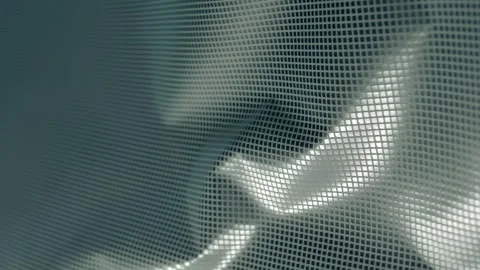 Fabric with a shiny checkered pattern flutters in the wind Stock Footage 303301053