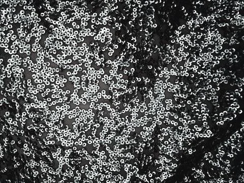 Fabric Silver texture with spangles. Background sequin. Glitter texture. Fabr Stock Photos