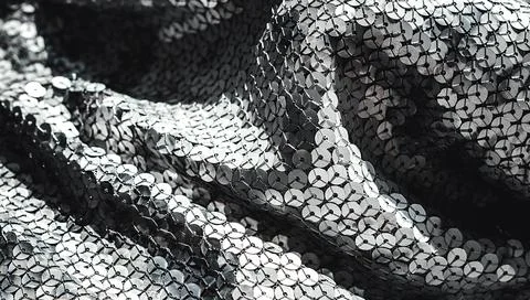 Fabric Silver texture with spangles. Background sequin. Glitter texture. Fabr Stock Photos