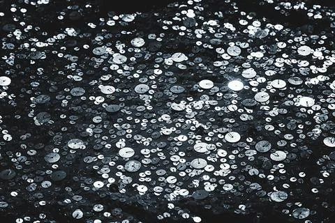 Fabric Silver texture with spangles. Background sequin. Glitter texture. Fabr Stock Photos