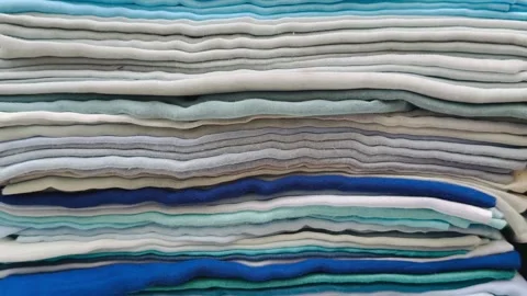 Fabric Stack in Blue Shades Stock Footage 347286870
