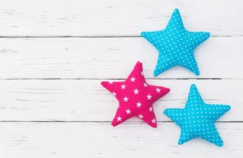 Fabric stars on white background Stock Photos