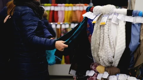In the fabric store a large selection of fabrics, you can cut a piece and buy, Видео 123405675