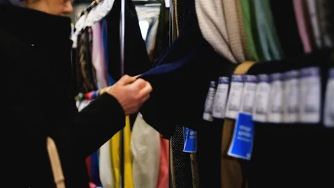 In the fabric store a large selection of fabrics, you can cut a piece and buy, Video stock 123446736